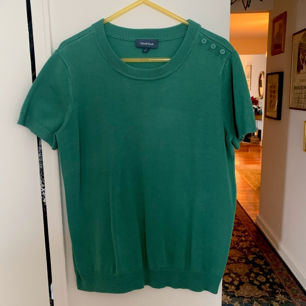 Modcloth short sleeve sweater dress with button detail.